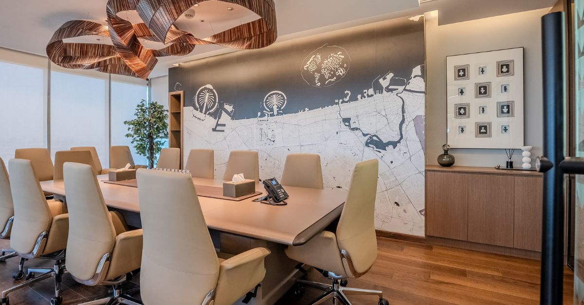 Conference table and meeting chairs in Ahmedabad office collaboration zone