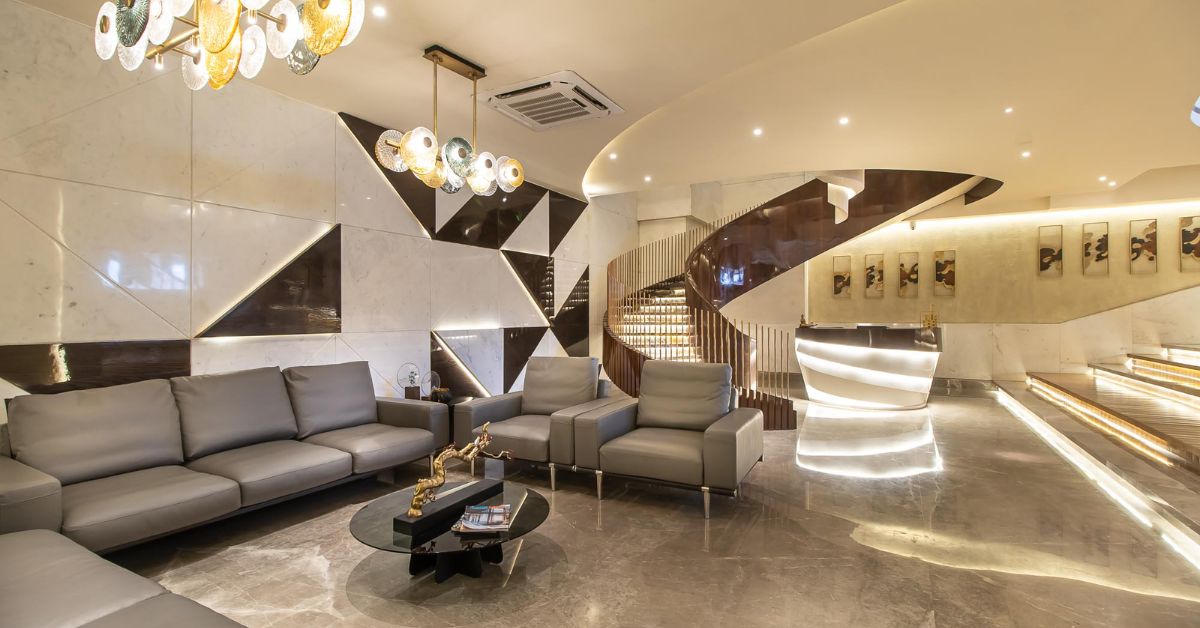 Modern reception desk and lounge seating for Ahmedabad office entrance